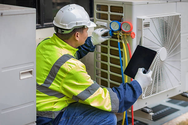 Professional Air Conditioning Repair technician working in Roxbury, MA
